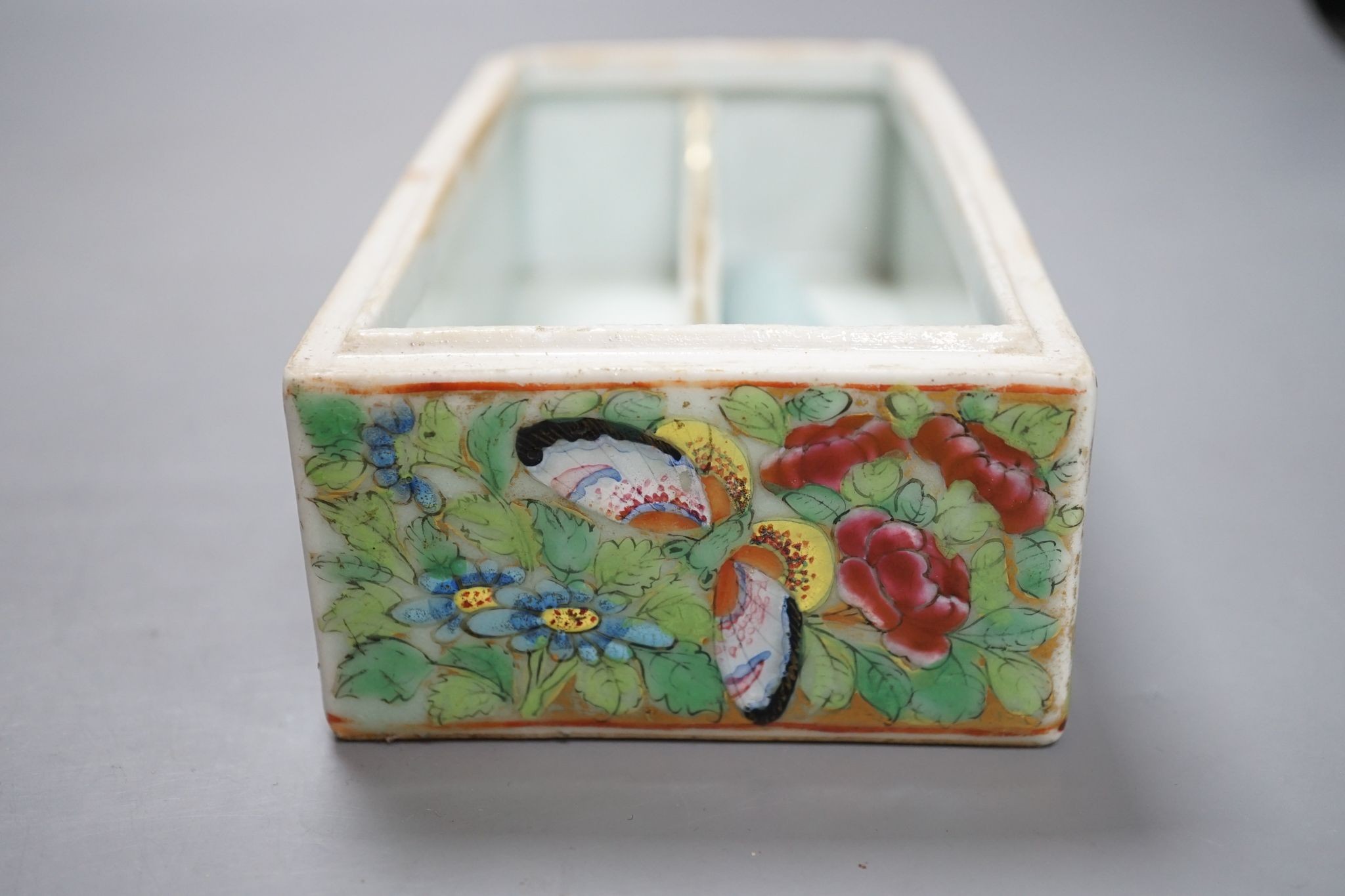 A Canton famille rose pen box, restored, 19cm
